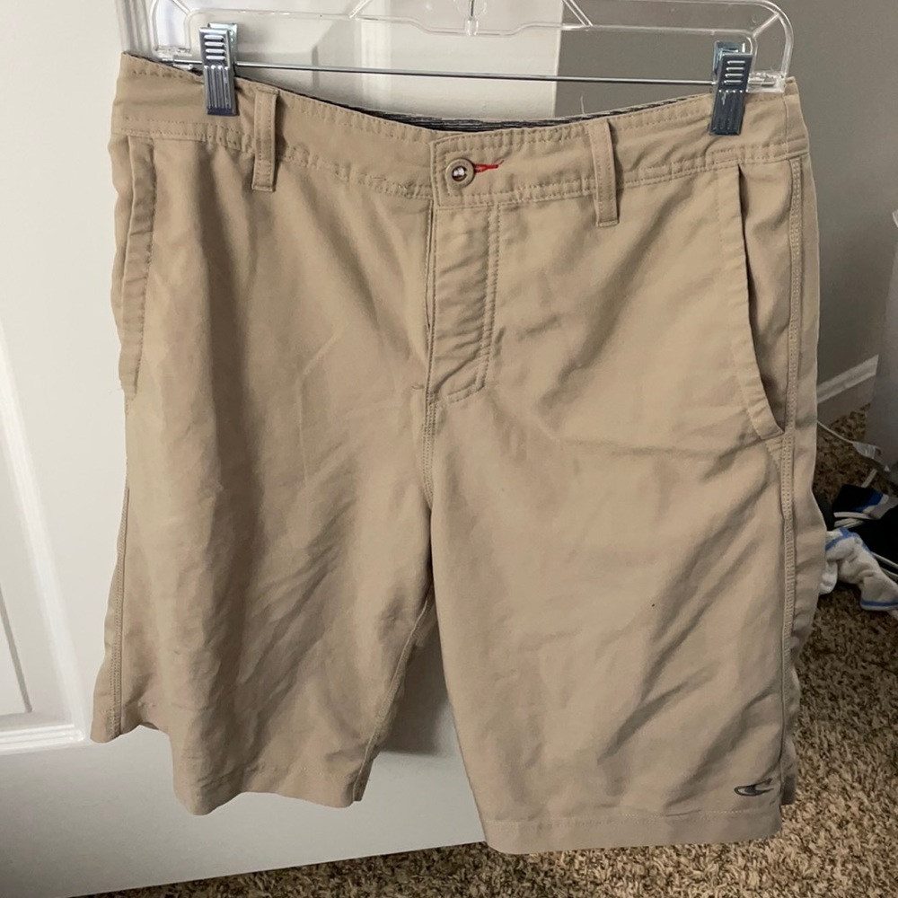 Lightly worn tan Hybrid shorts. Waist size 30.